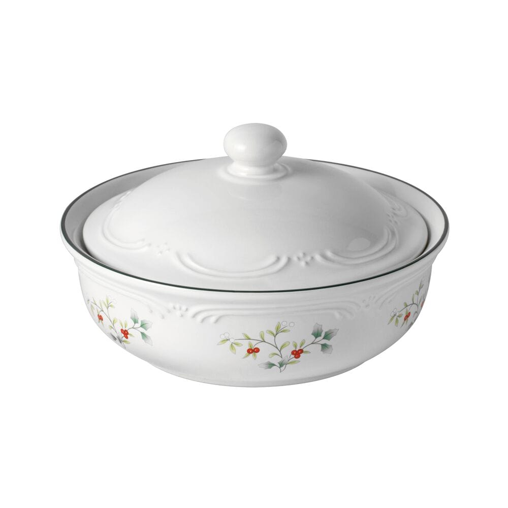 Winterberry round covered casserole with lid in white porcelain featuring holly motif.