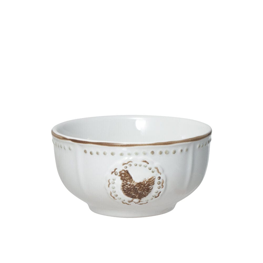 Teal blue bowl with chevron exterior and pink interior featuring a flamingo pattern inside.