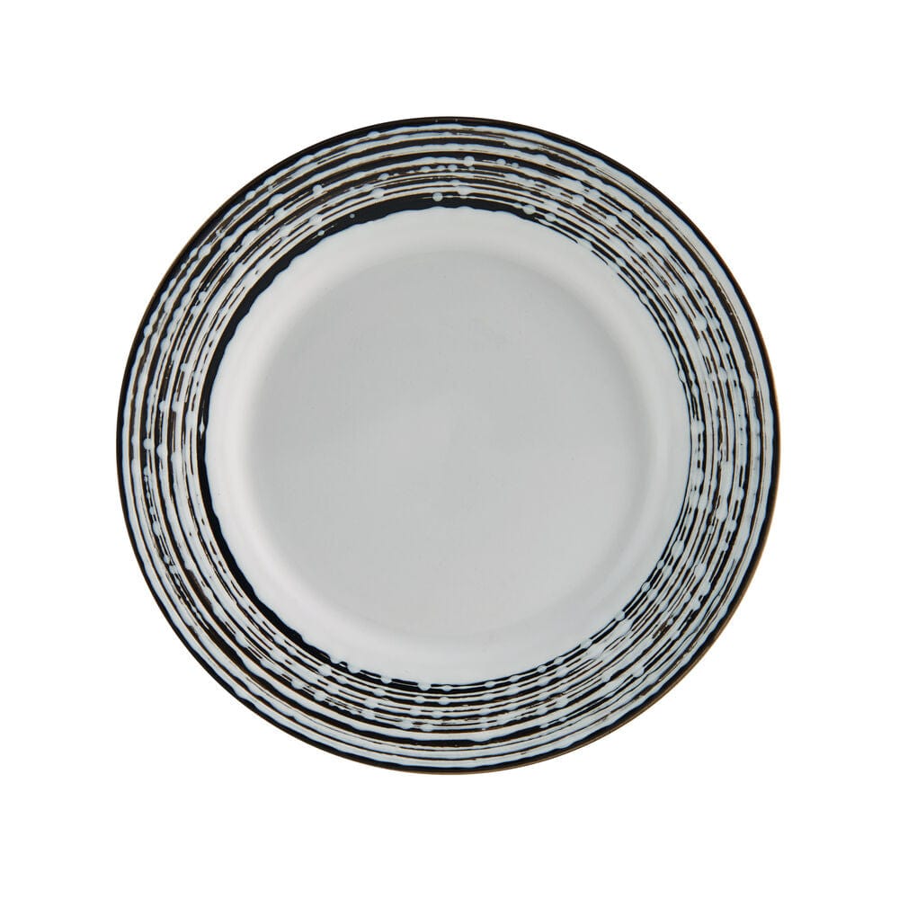 Top-down view of Bryson white dinner plate with bold black brushstroke rim.