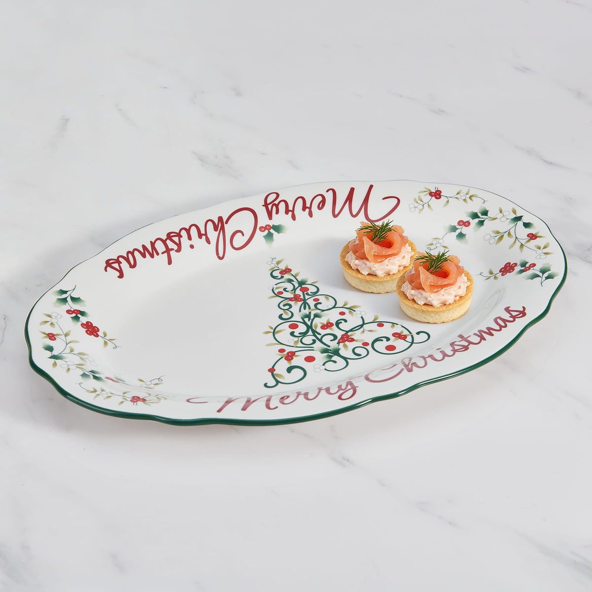 Winterberry Merry Christmas platter with holly border and red script along edge