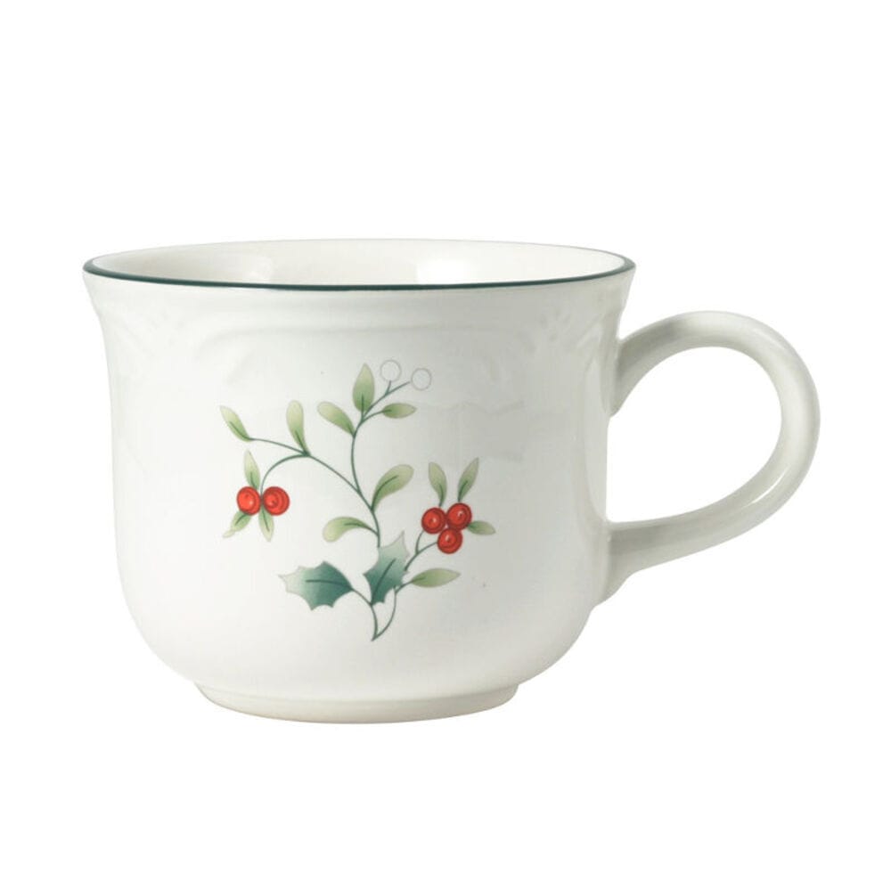 White Winterberry tea cup with holly branch design and a green rim.