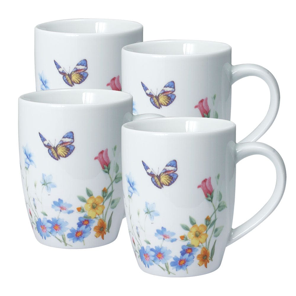 Four white mugs with butterfly and floral pattern arranged together on a white background.