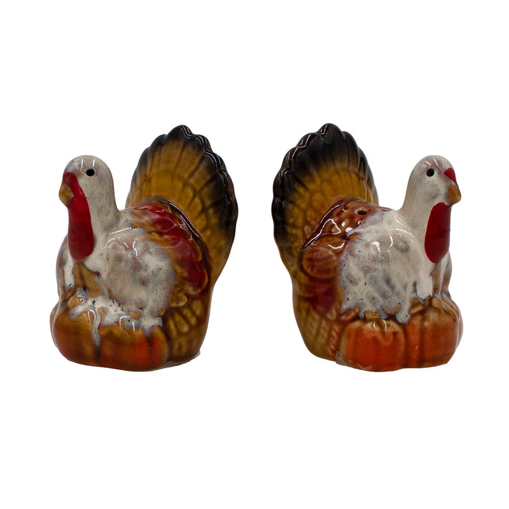 Plymouth Turkey Salt and Pepper Set two ceramic turkeys with red wattles and brown tails.