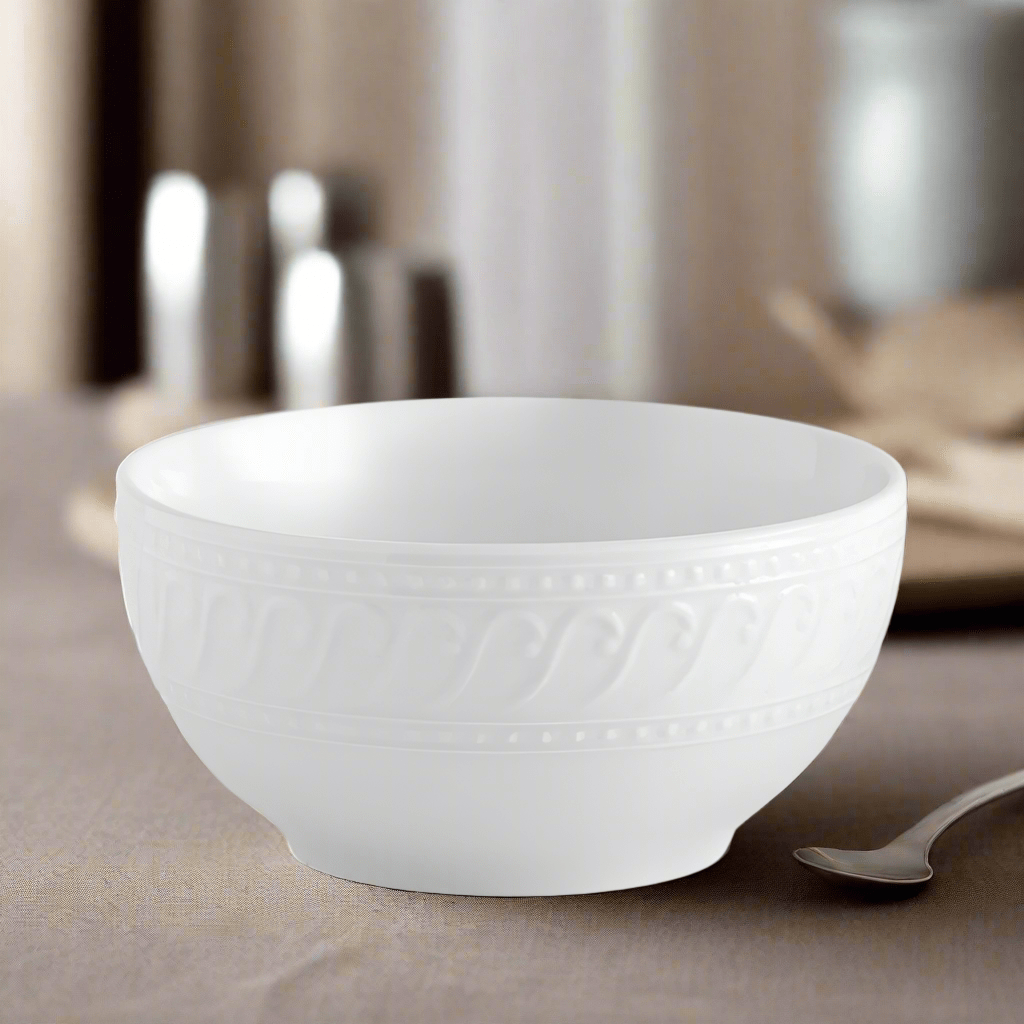 White Sylvia soup cereal bowl with embossed decorative pattern on a neutral table.
