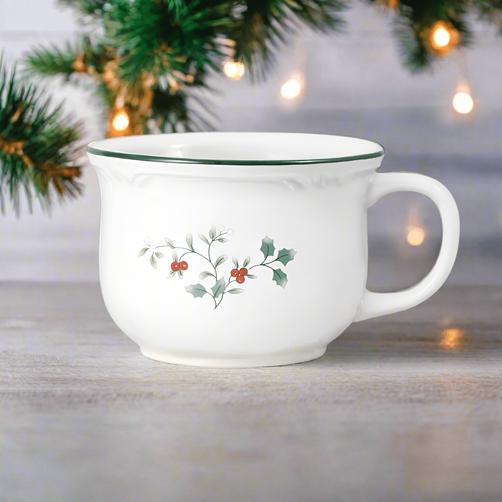 Winterberry jumbo soup mug in white with holly motif and green rim