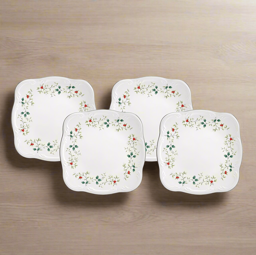 Winterberry set of four square dinner plates with holly border.