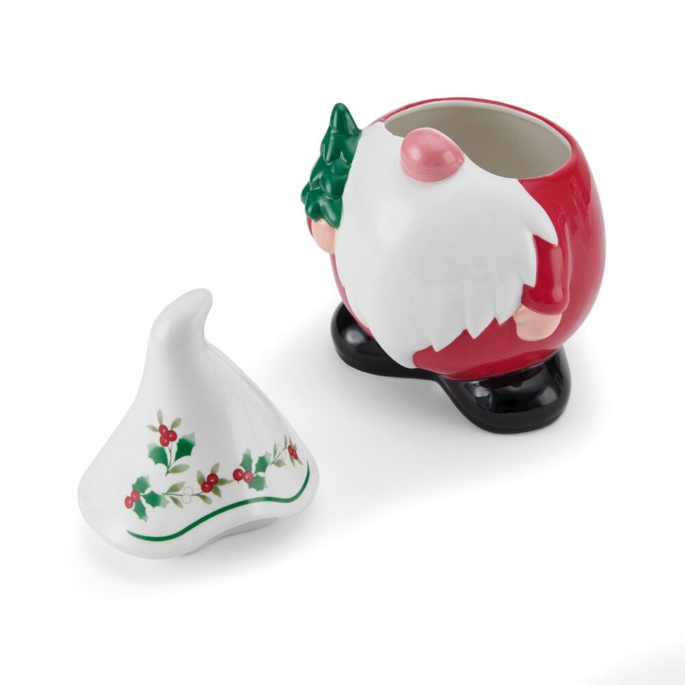 Winterberry Gnome Cookie Jar opened to reveal the red gnome body and white beard with the holly lid set to the side.