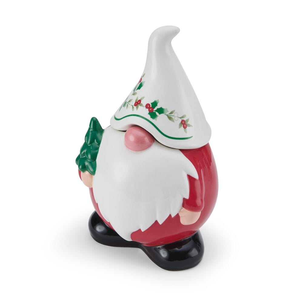 Winterberry Gnome Cookie Jar shown from the side with a white hat featuring holly, red suit, and black base.