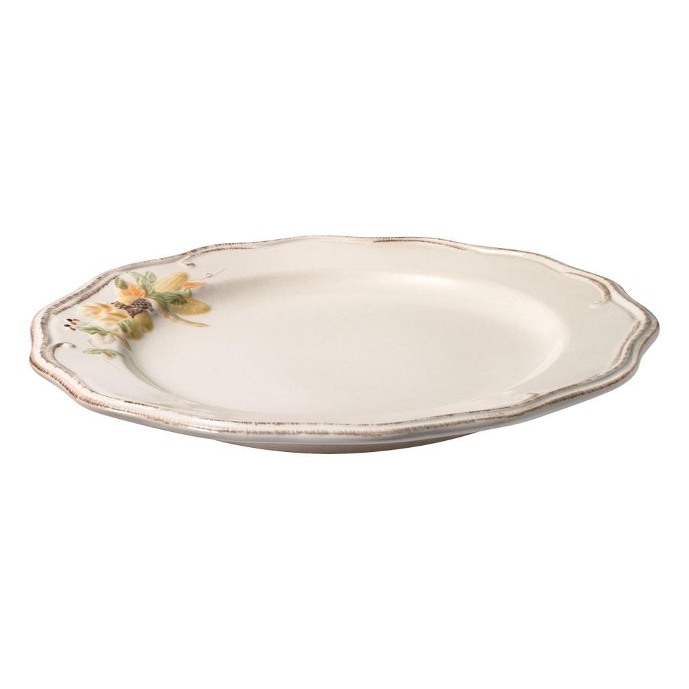Side view of Plymouth dinner plate showing a shallow bowl and delicate floral border along the rim