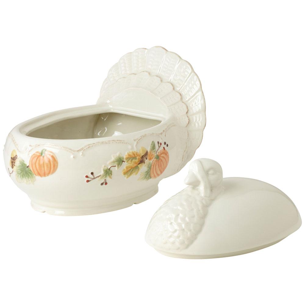 Cream porcelain Plymouth turkey shaped covered serving dish with autumn pumpkin and leaf motif.