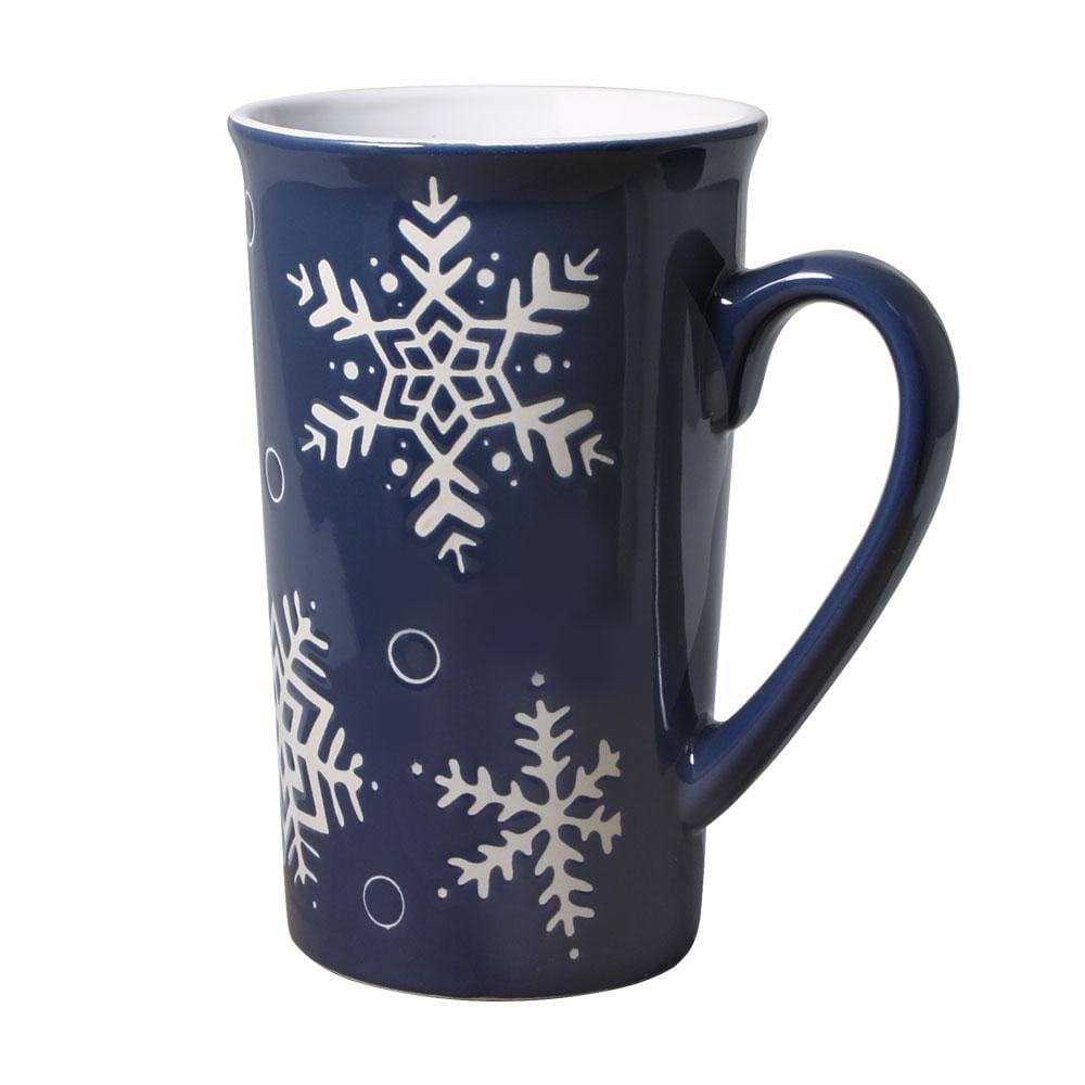Side view of navy Snow Flurry Latte Mug with white snowflake pattern on a white background
