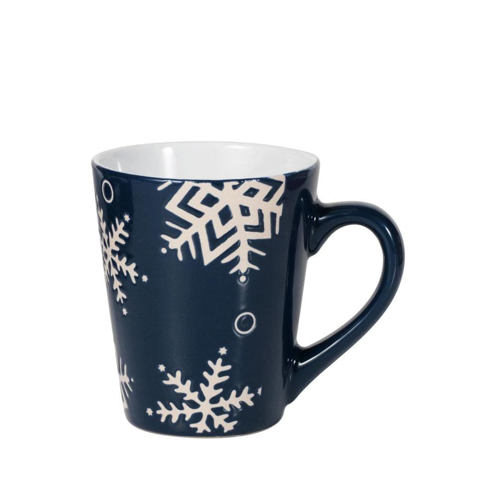 Close-up of a navy mug with white snowflake design.