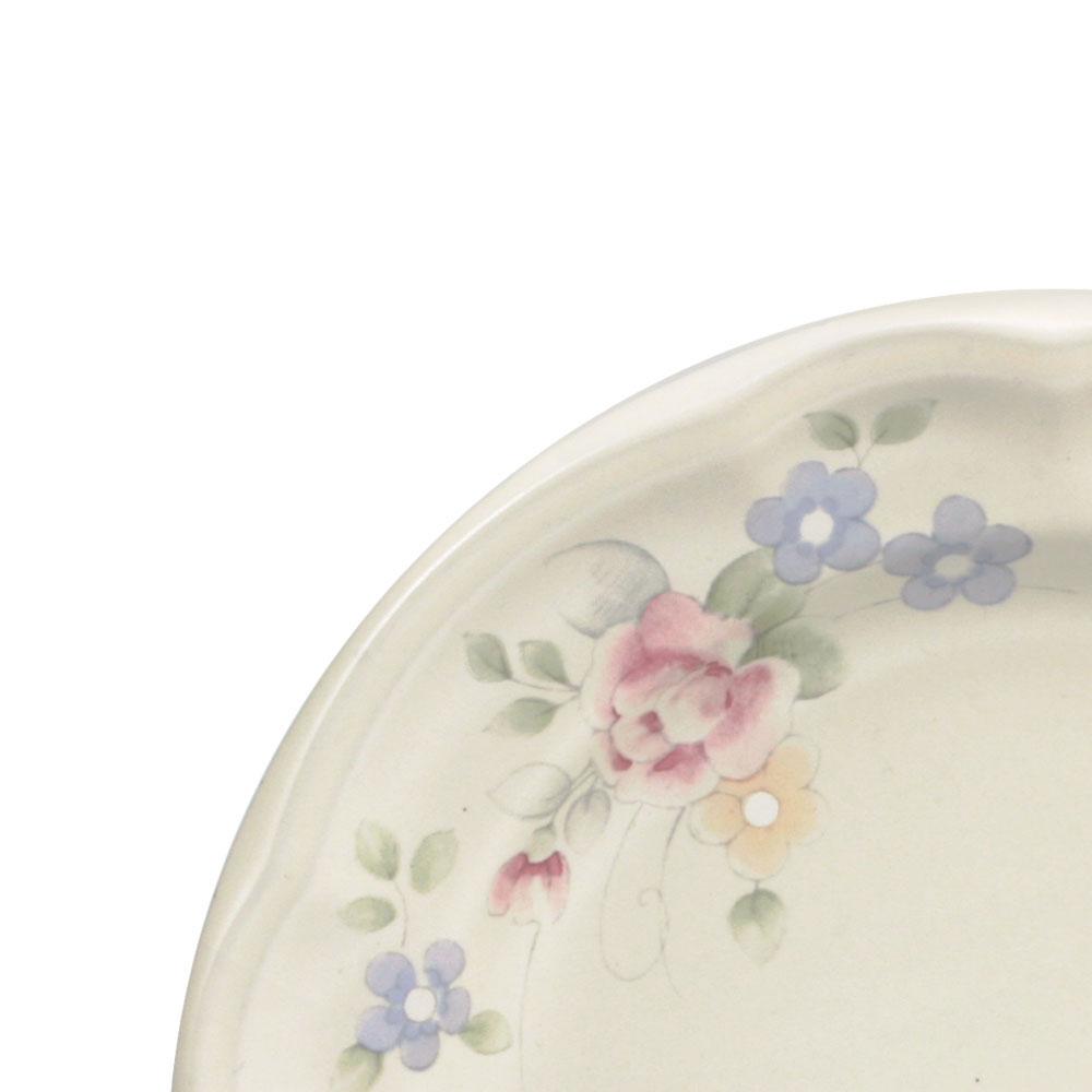 Tea Rose salad plate showing pink rose and blue flowers along the rim.