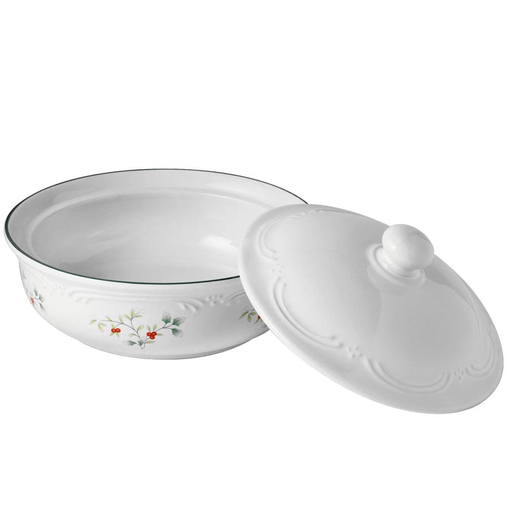 Winterberry round casserole with lid removed, showing a white interior and holly pattern on the exterior.