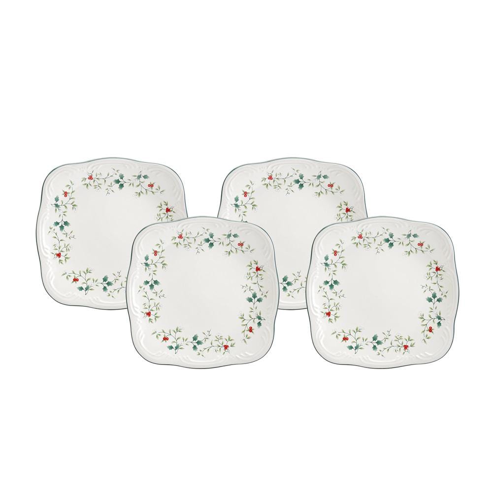 Winterberry four square salad plates with holly border on a white backdrop.