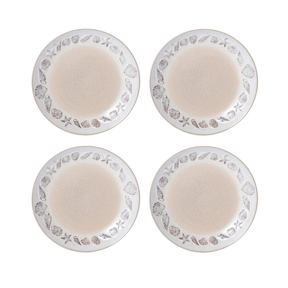 Four Panama dinner plates with beige centers and a repeating shell border around the rim