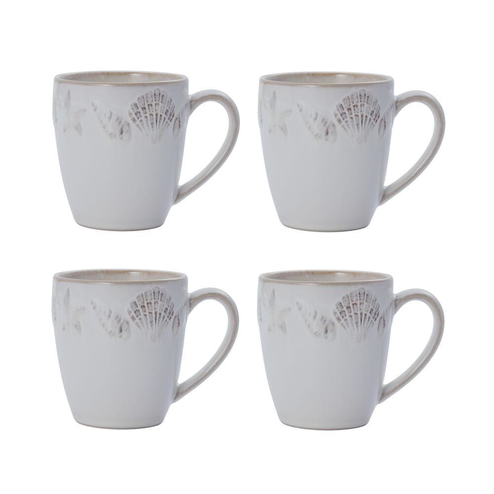 Four white mugs with seashell motif around the top edge.