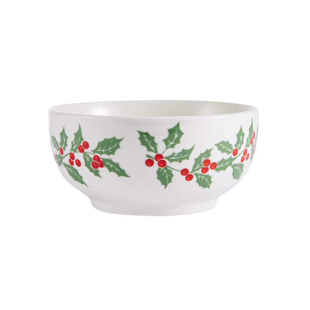 White bowl with a green holly leaf and red berry pattern around the edge