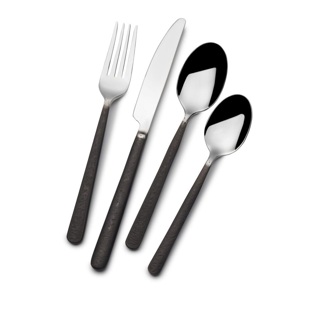 Calyx Black Forged 20 piece flatware set for four with fork knife and two spoons showing dark textured handles