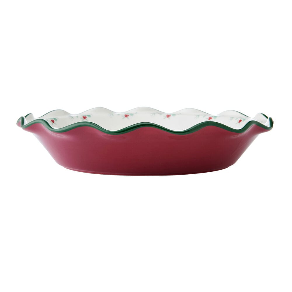 Winterberry Pie Plate with red exterior and white scalloped rim decorated with holly berries.