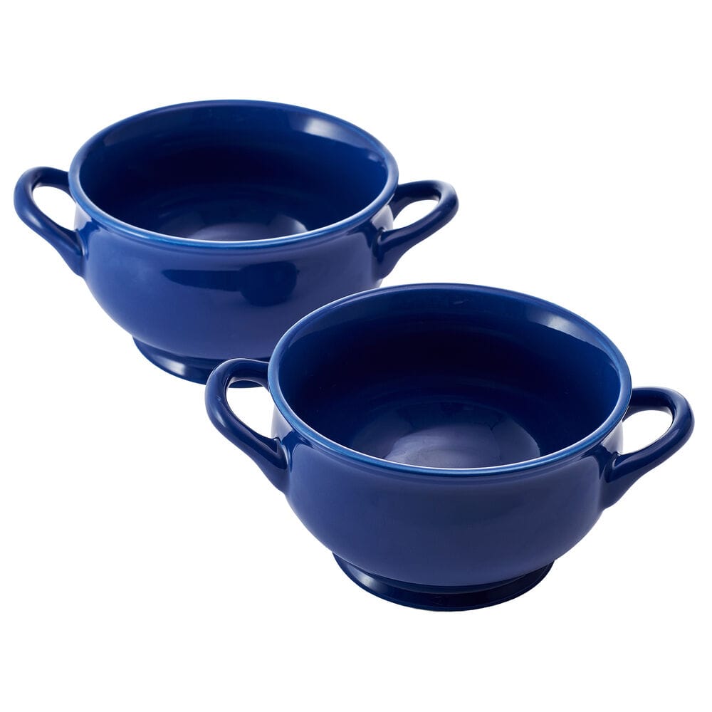 Close-up of two cobalt blue double-handle chowder bowls on a white background.