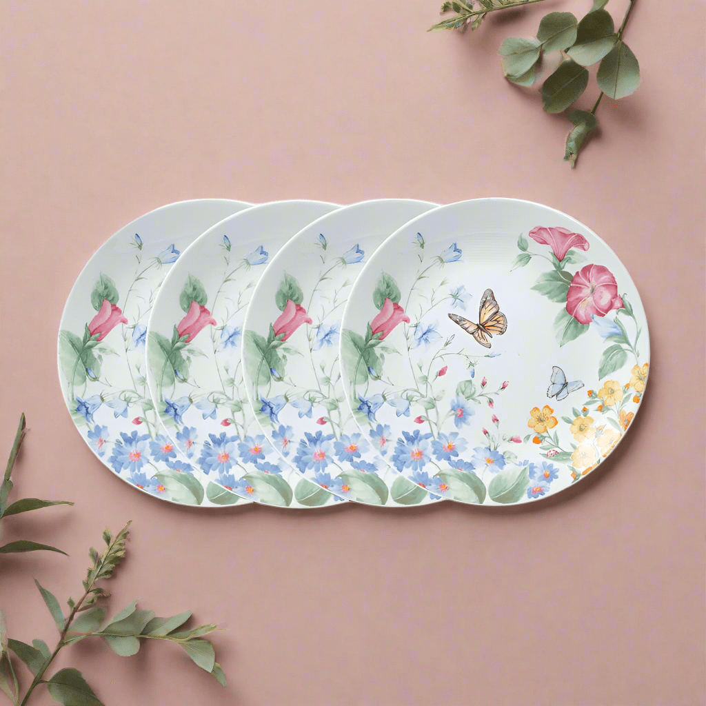 Annabelle set of four salad plates with floral designs and butterflies on a white background