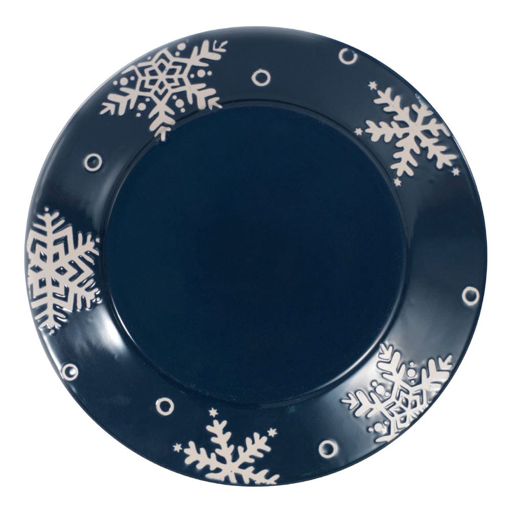 Top-down view of navy Snow Flurry plate edge adorned with white snowflakes