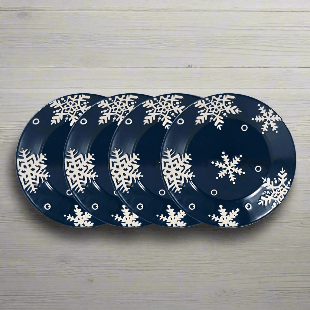 Snow Flurry salad plates set of four with white snowflakes on navy blue background
