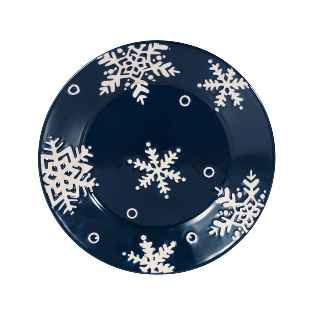 Navy blue salad plate featuring white snowflake motifs from the Snow Flurry set of four