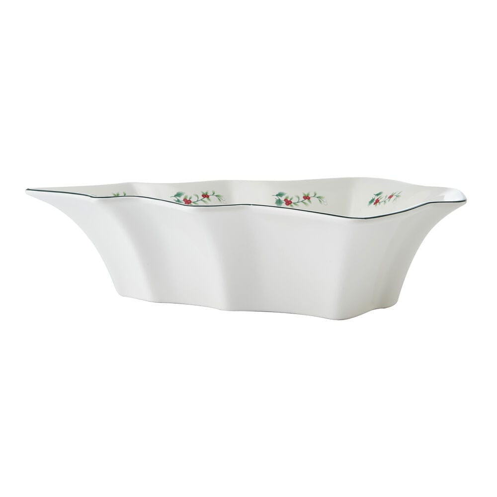 Side view of white Winterberry Tree Serve Bowl with sculpted wavy rim.