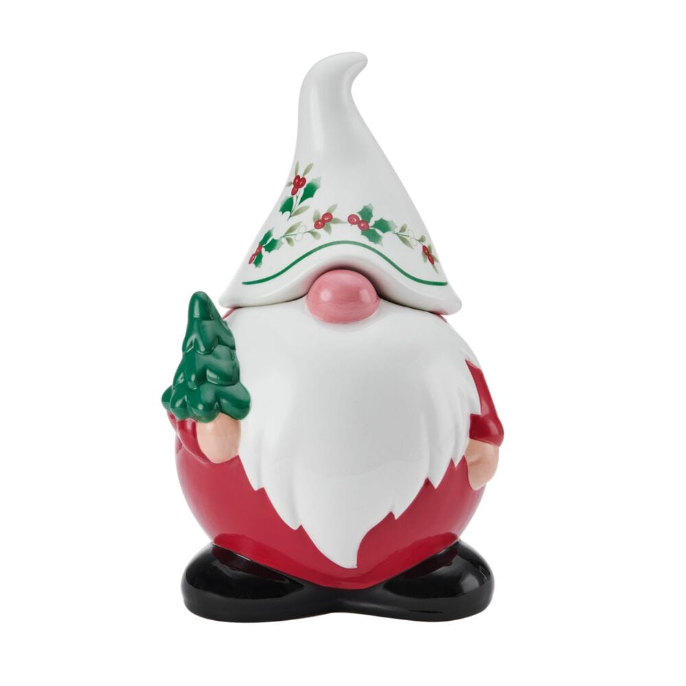 Winterberry Gnome Cookie Jar front view with a tall white hat adorned with holly, pink nose, red body, and black shoes.