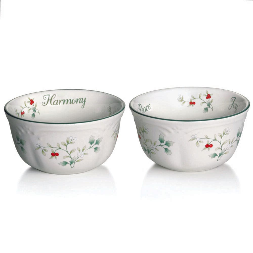 Two Winterberry dessert bowls with holly design and sentiment motifs on rims.