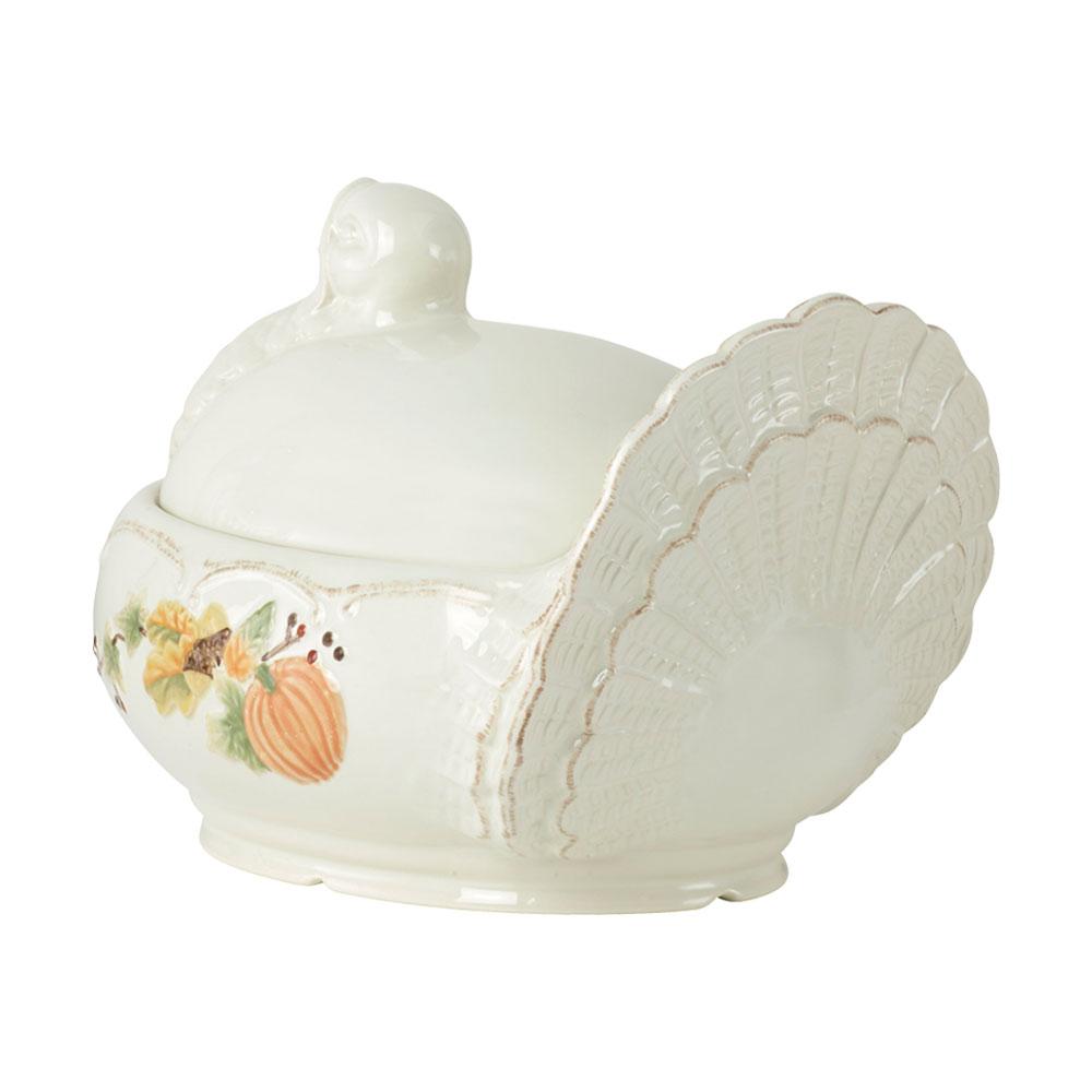 Side view of a cream Plymouth turkey shaped covered serving dish featuring a fan tail lid.