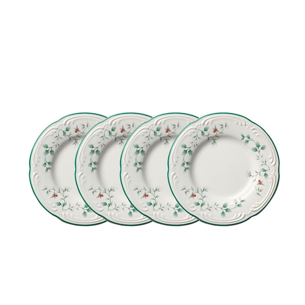 Four Winterberry bread and butter plates with holly design and green rims
