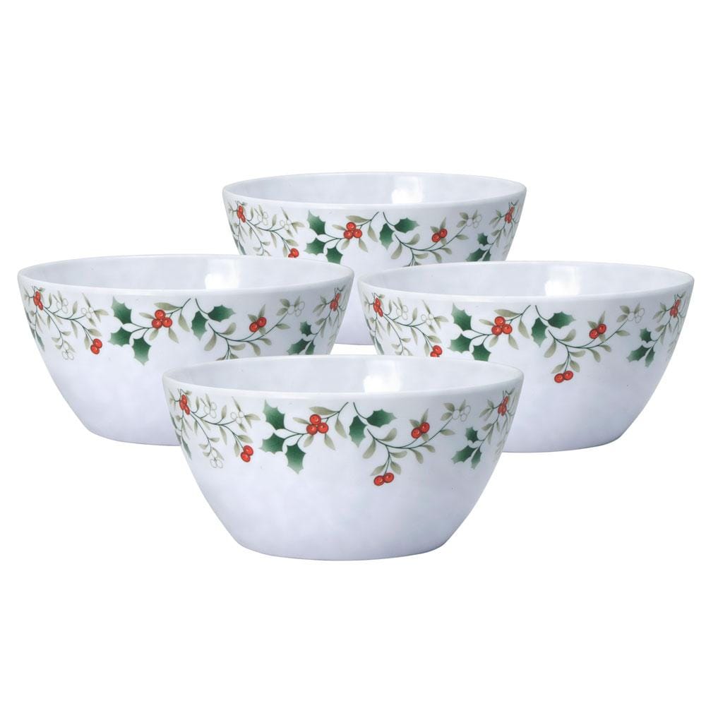 Four Winterberry melamine cereal bowls arranged together with holly pattern on a wooden surface