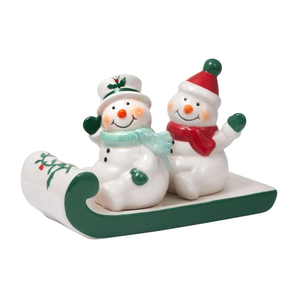 Winterberry snowmen on sleigh salt and pepper set featuring two smiling snowmen with scarves on a green curved sleigh